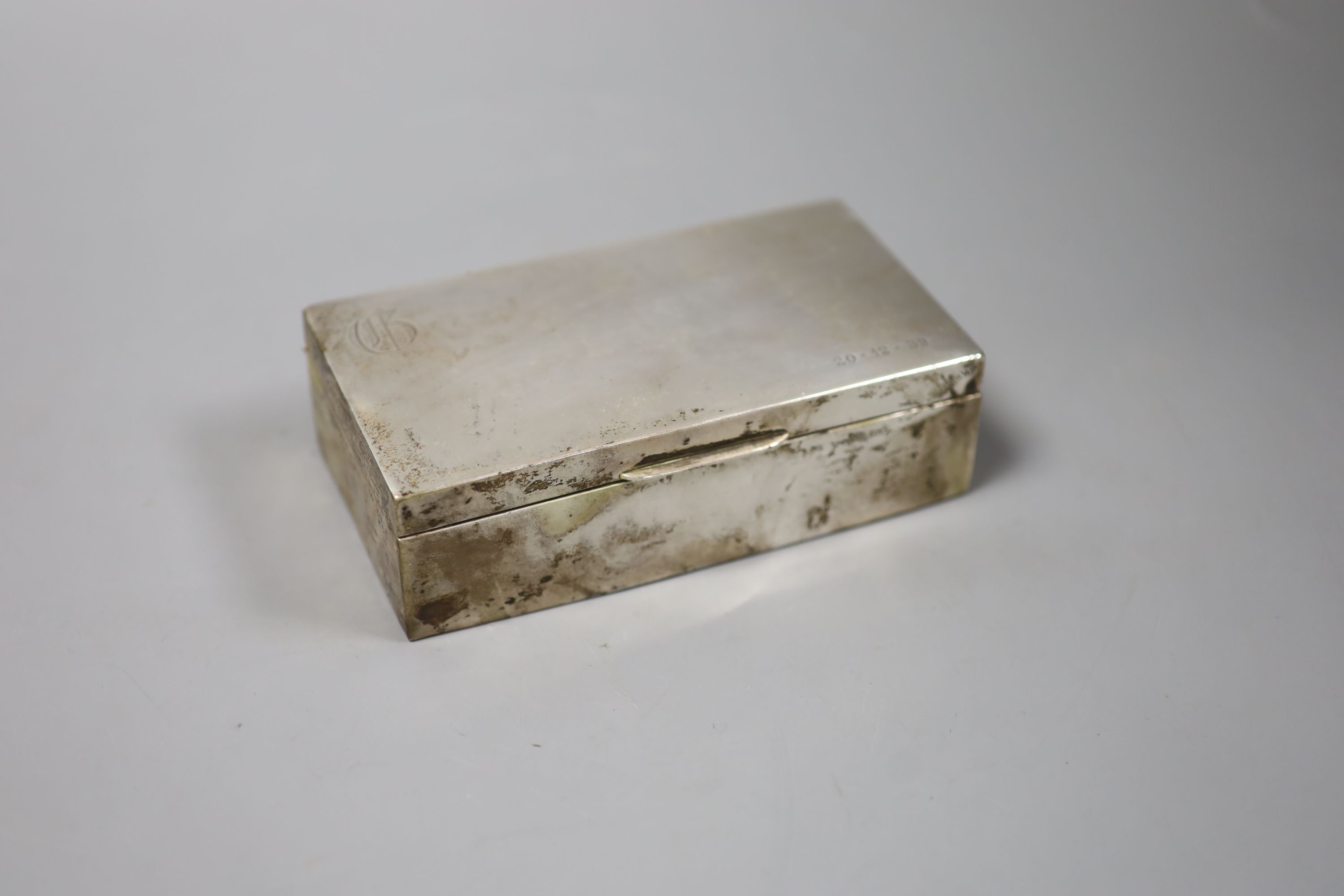 A continental white metal mounted rectangular cigarette box, stamped 'M Levy Sterling'